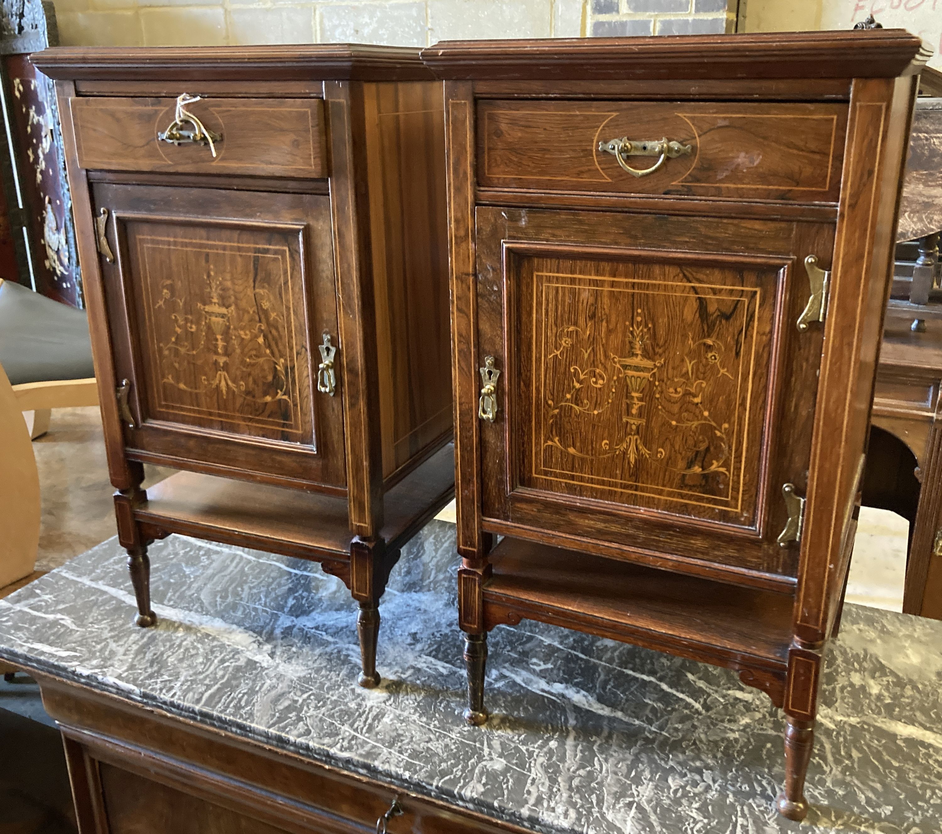 A pair of Edwardian marquetry inlaid rosewood bedside cupboards, width 39cm, depth 38cm, height 69cm